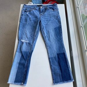 Patch straight ripped jeans